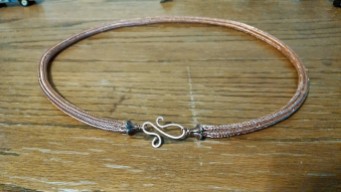 A copper wire chain woven in viking style.